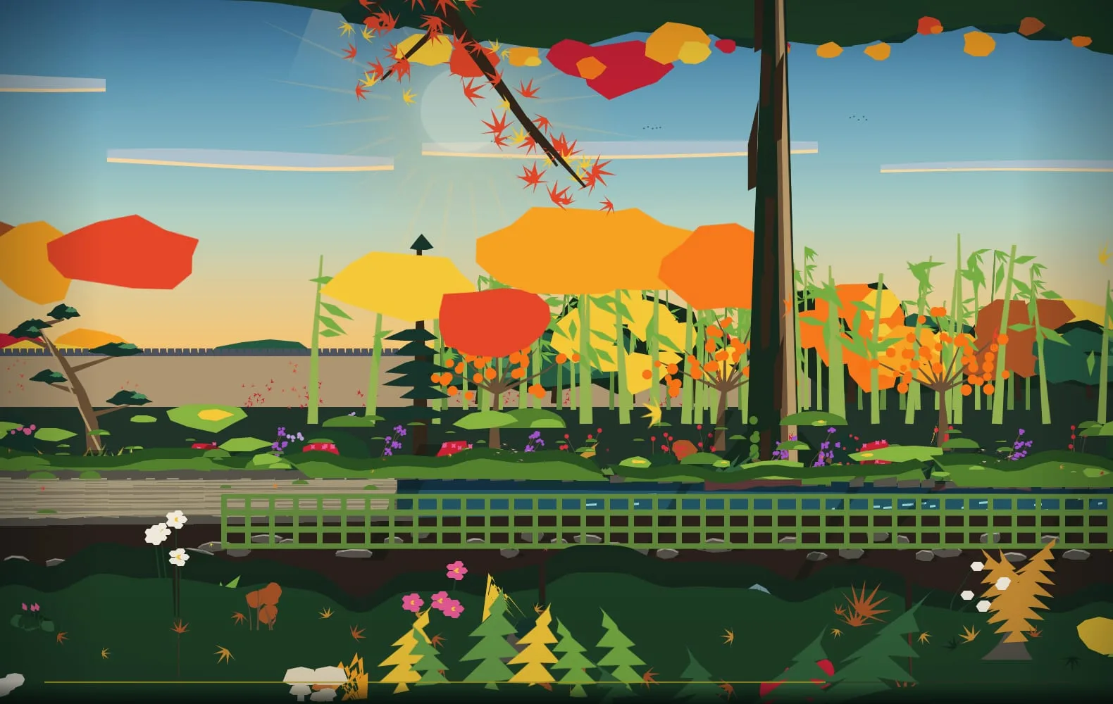 The garden prototype: autumn maples in orange and red over a pond, a small footbridge, a wooden lantern